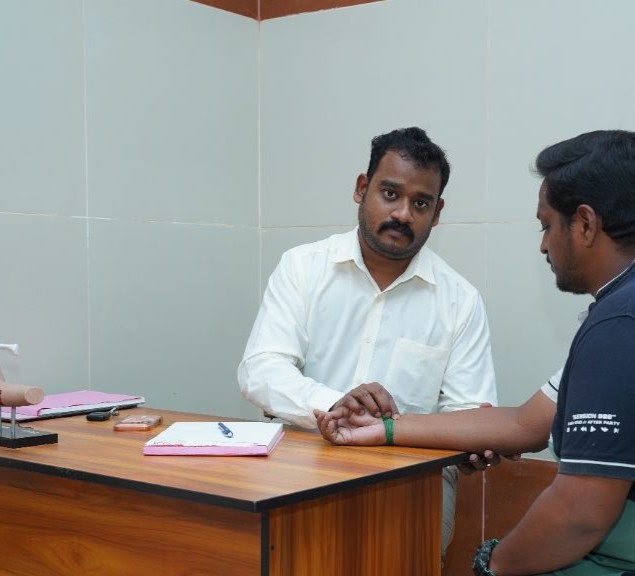 Dr. M K Dinesh Kumar